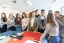 Catherine Tsékenis, directrice de la Fondation Hermès, entourée d'élèves du lycée Rouvière